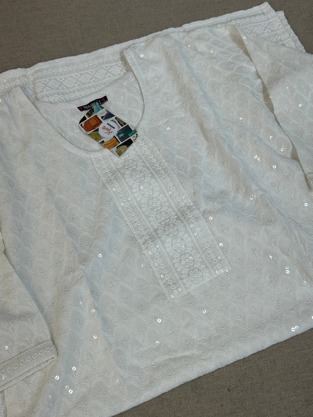 White chikankari kurti with light sequin work by Kurti Connection USA
