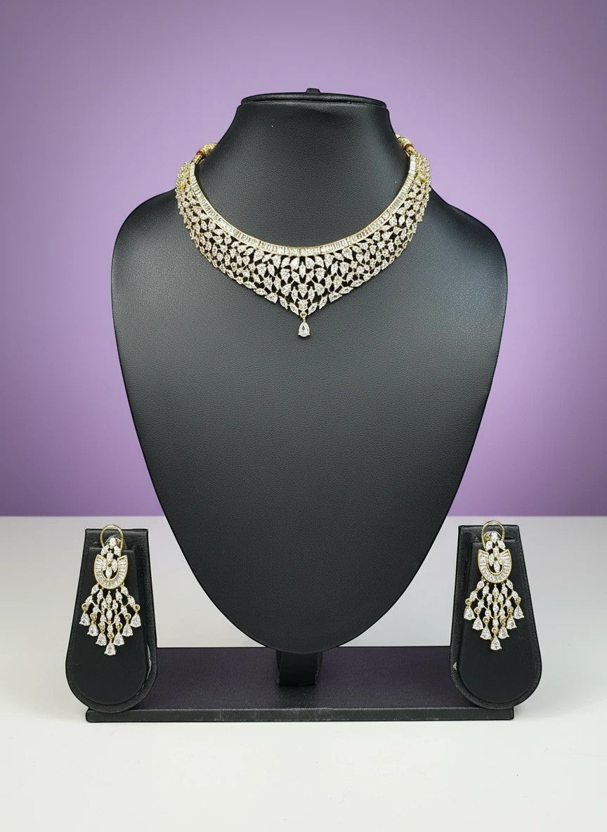 House Of Indian Wedding Attire gold-toned choker necklace and dangling earrings set with clear cubic zirconia stones.